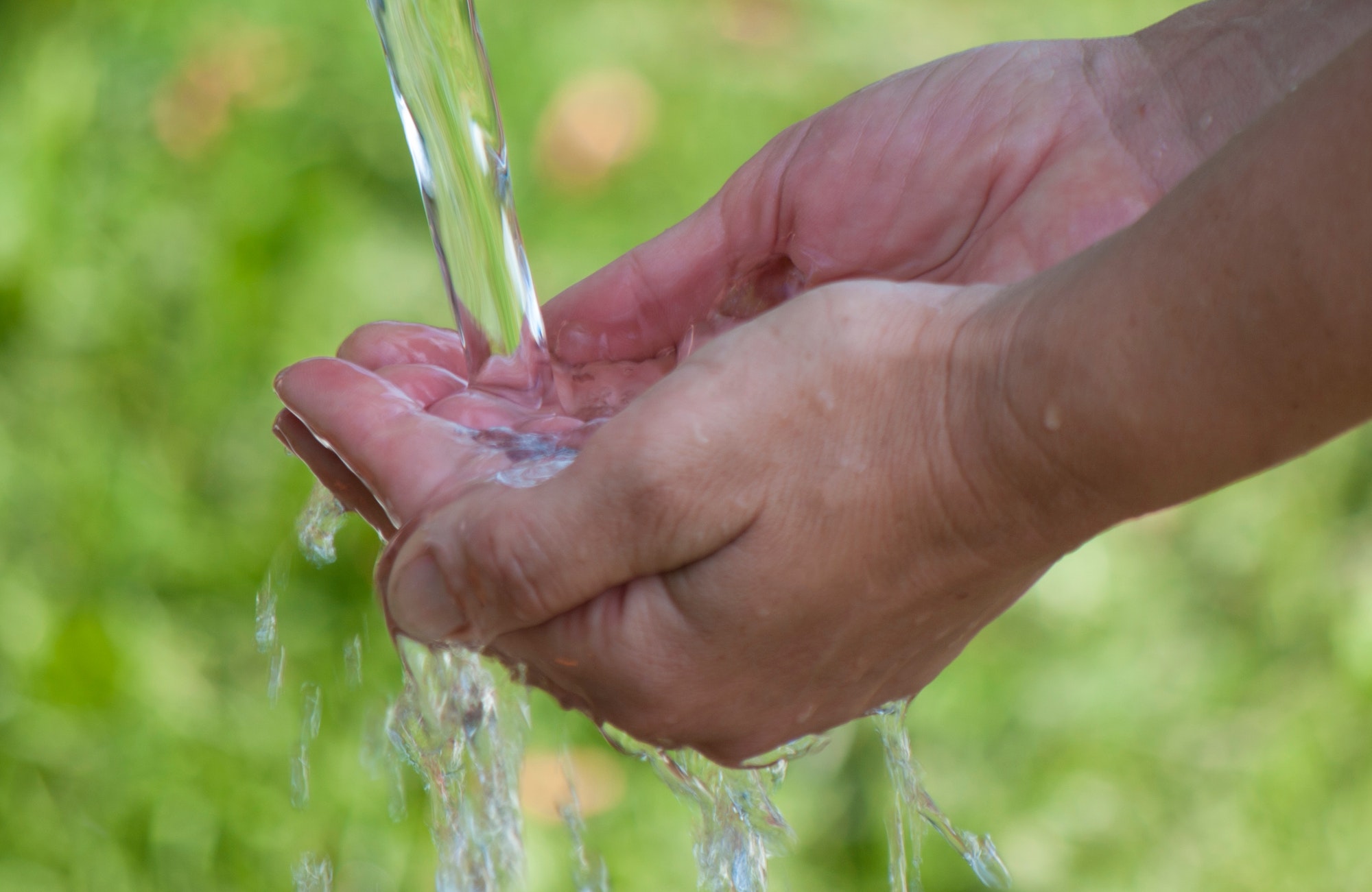 hands with clean water,